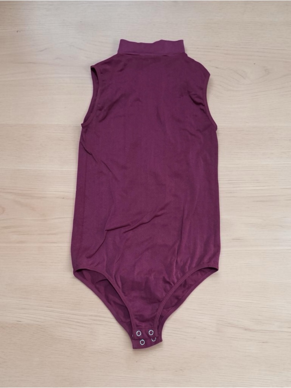 Sleeveless Mock Neck One-Piece Bodysuit in Plum